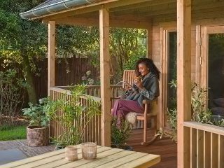 Teak schommelstoel